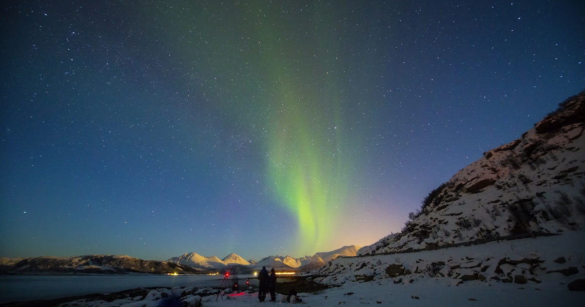 Aurora borealis glows above the Saariselkä fell wilderness in Finnish Lapland